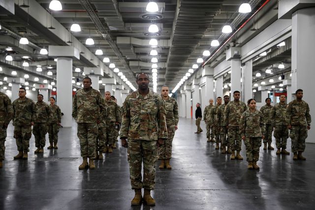 The National Guard stands in formation at the Jacob Javits Center, in New York.